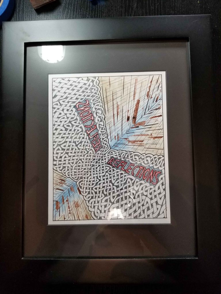 A framed abstract painting with mirrored knotwork